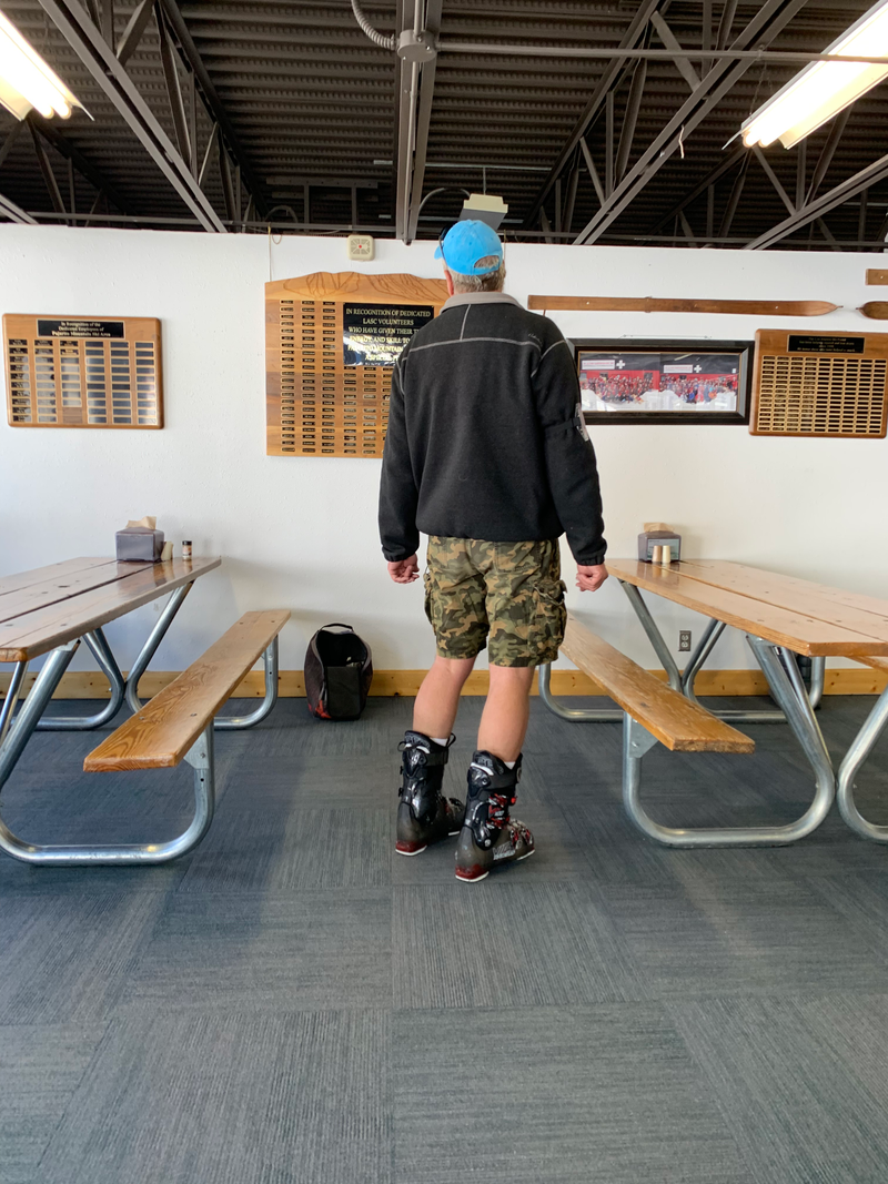 You know it’s spring skiing when locals start showing up in cargo shorts.